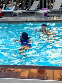 Kids had a great time swimming in the pool.