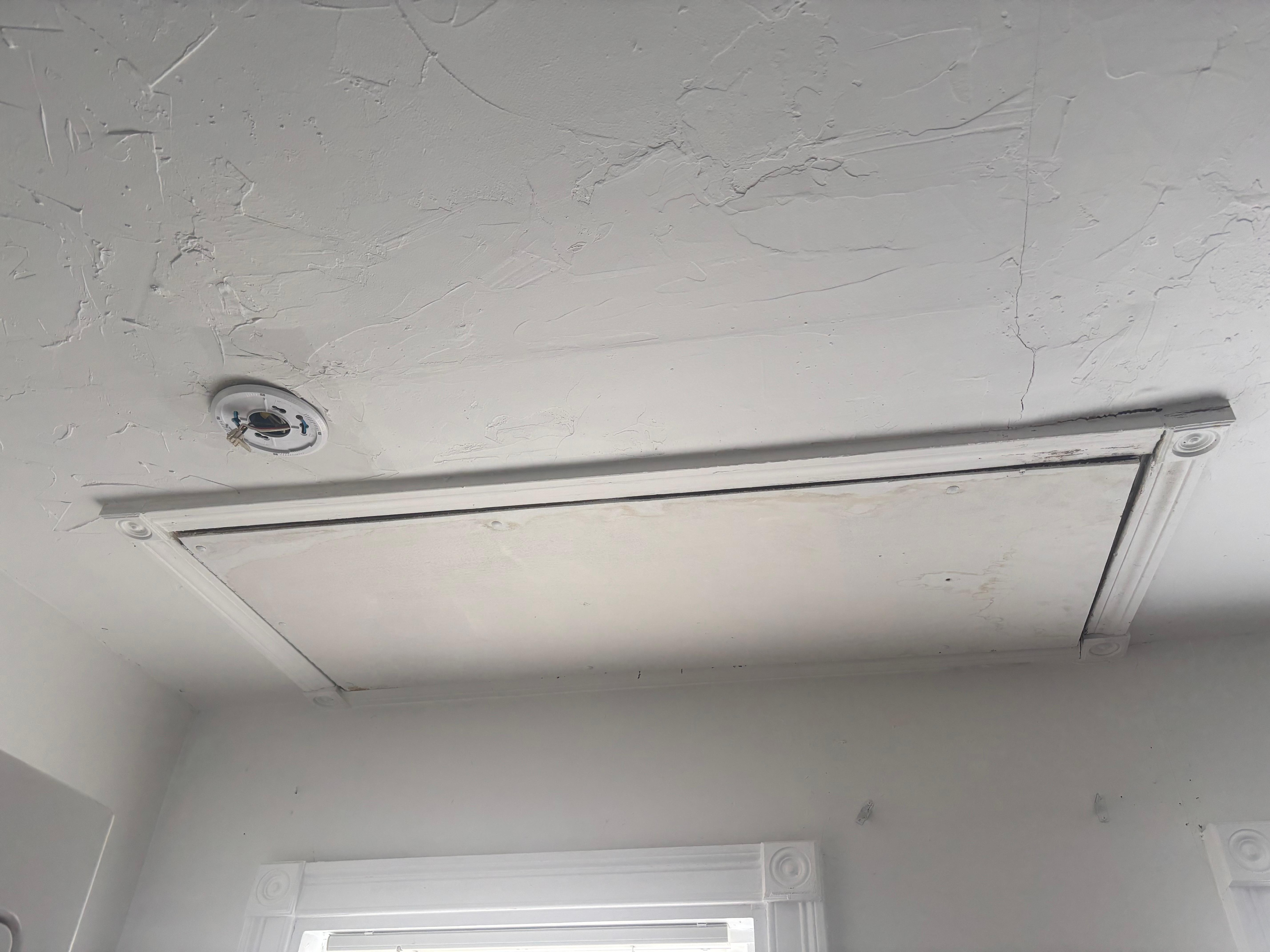 Missing smoke detector, loose trim