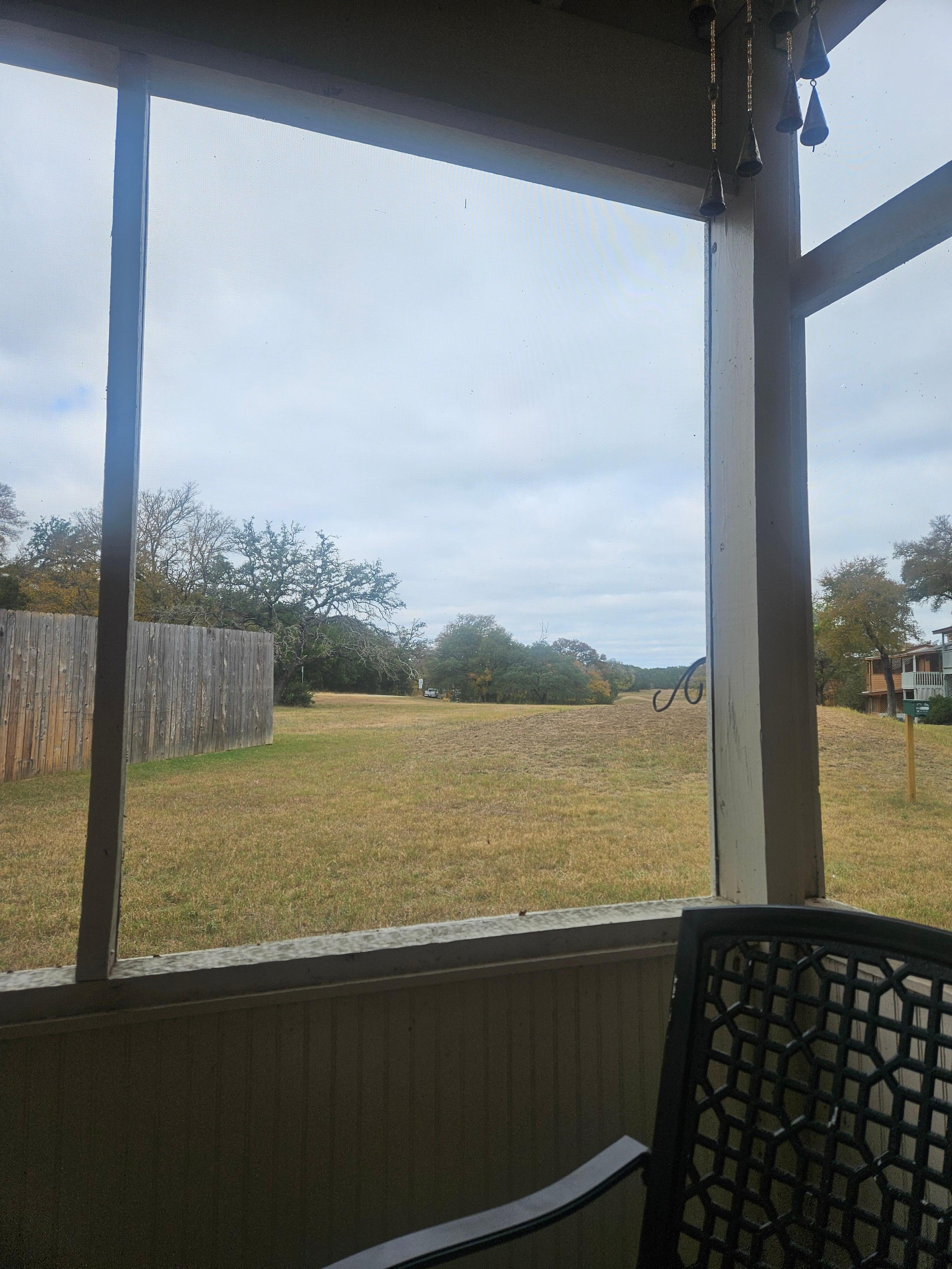 Screened-in back porch view