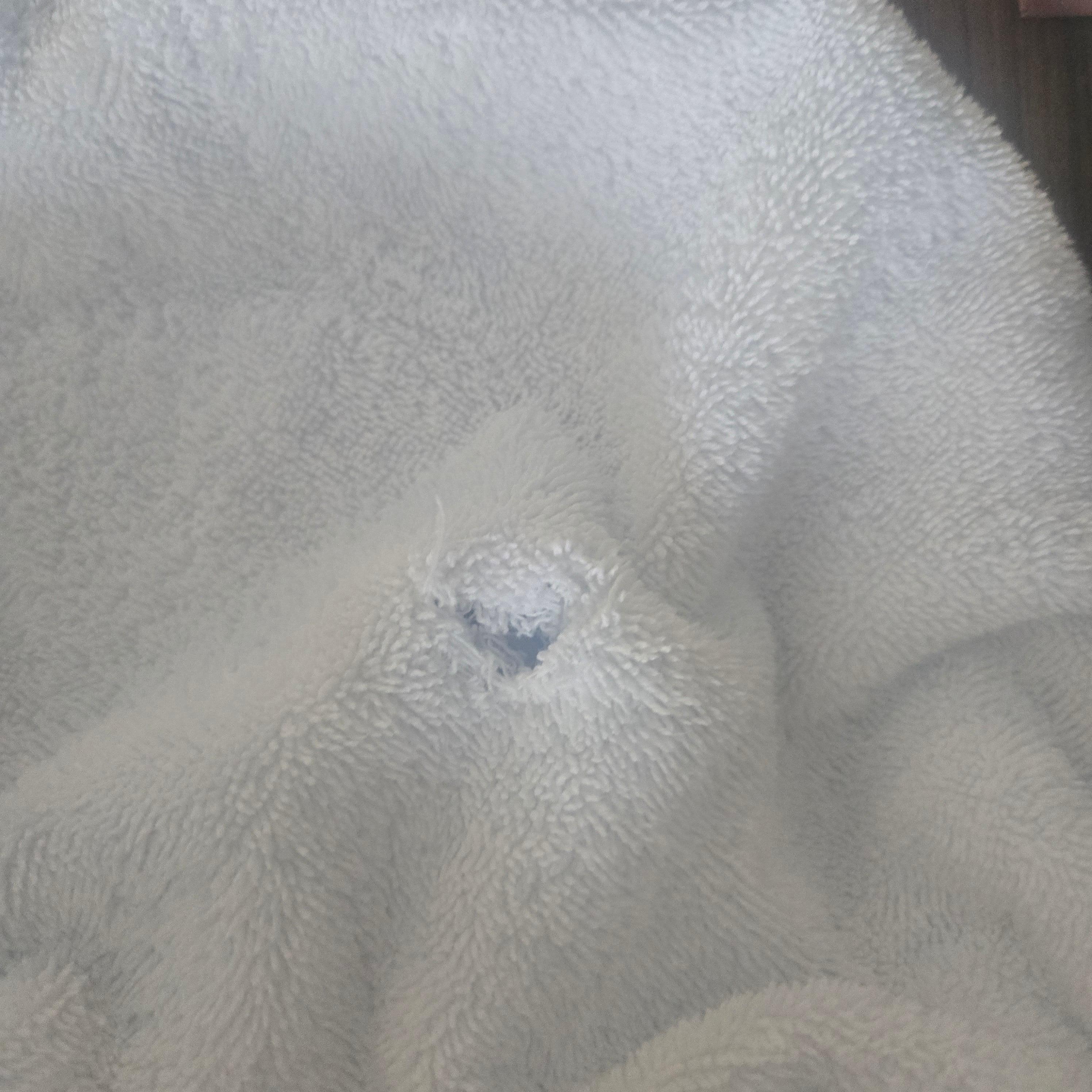 Towel with hole in it. 