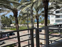 View from balcony towards park and beach
