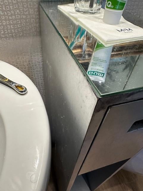 Old dirt on the stand next to the sink