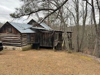 Side and back of Robinette Cabin