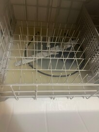 2 1/2 inches of disgusting dish washer waterthat smelled when you opened the door and they had no soap to use in the unit