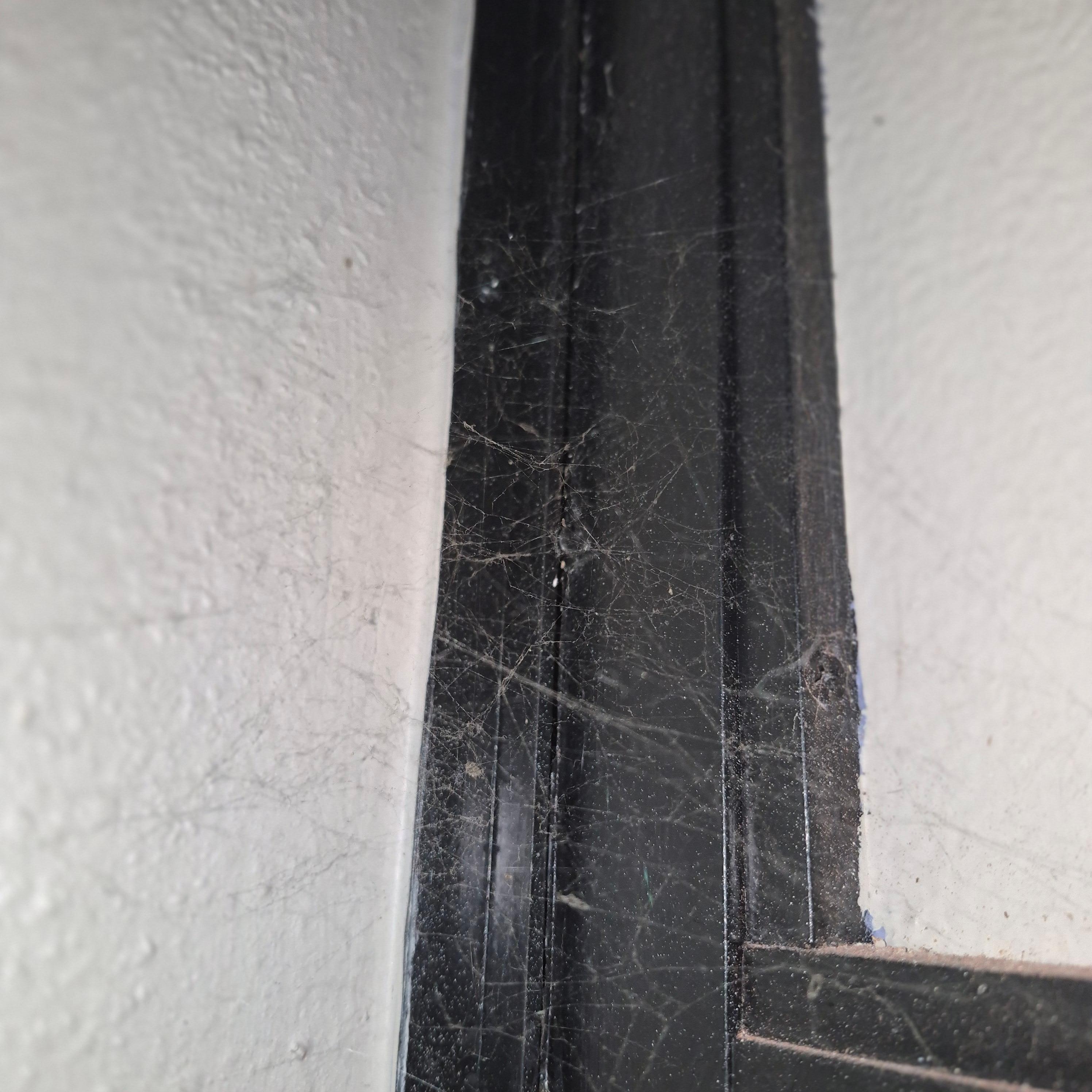 Cobwebs behind door