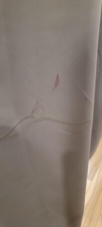 Blood stain on curtain