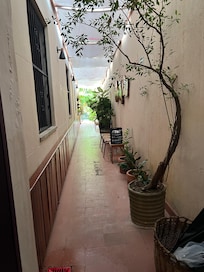 Passage to the pool and breakfast area