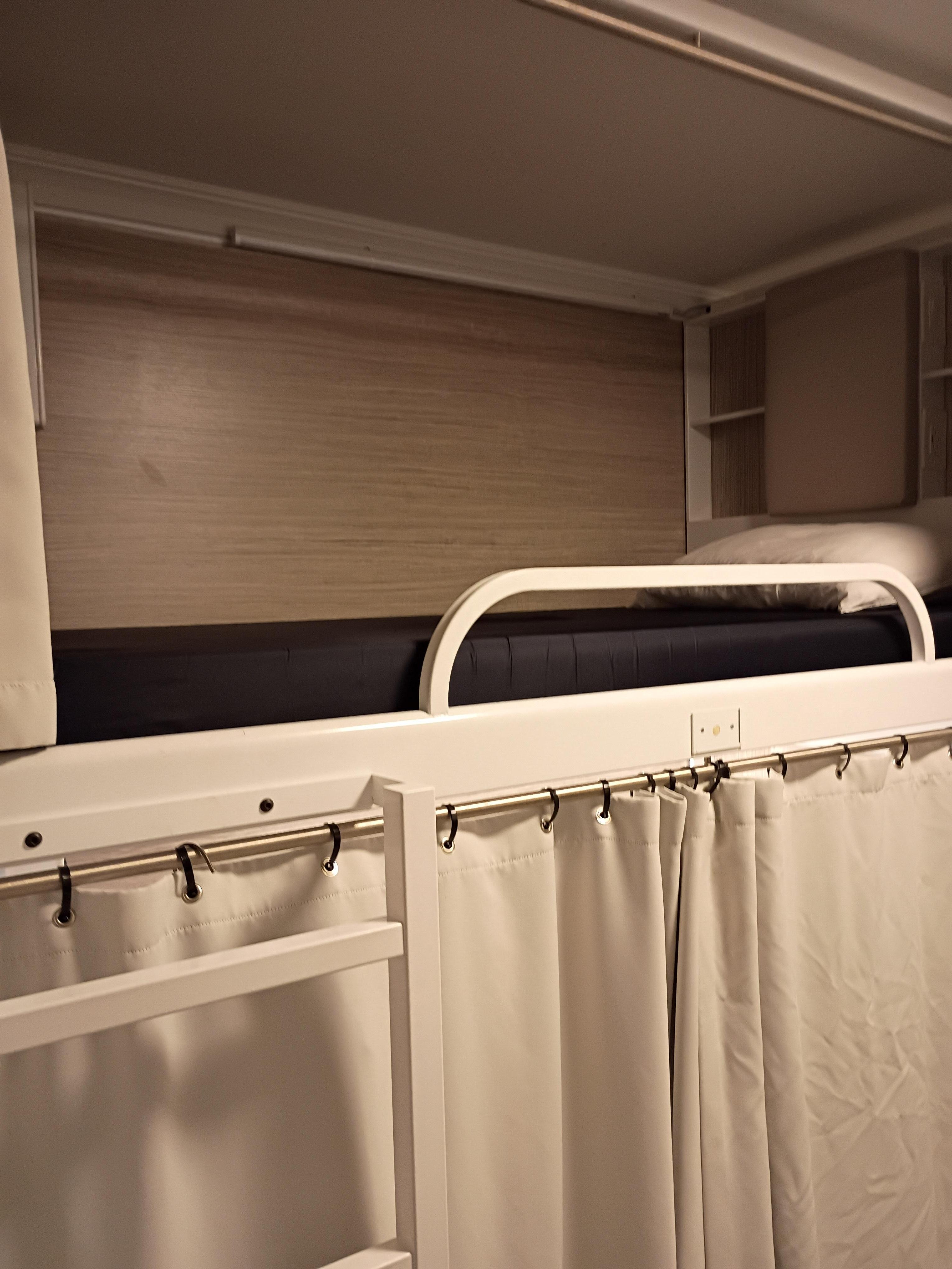 Dorm bedroom . Spacious. Mattress sleep very well. Well lite with storage spaces underneath and top 