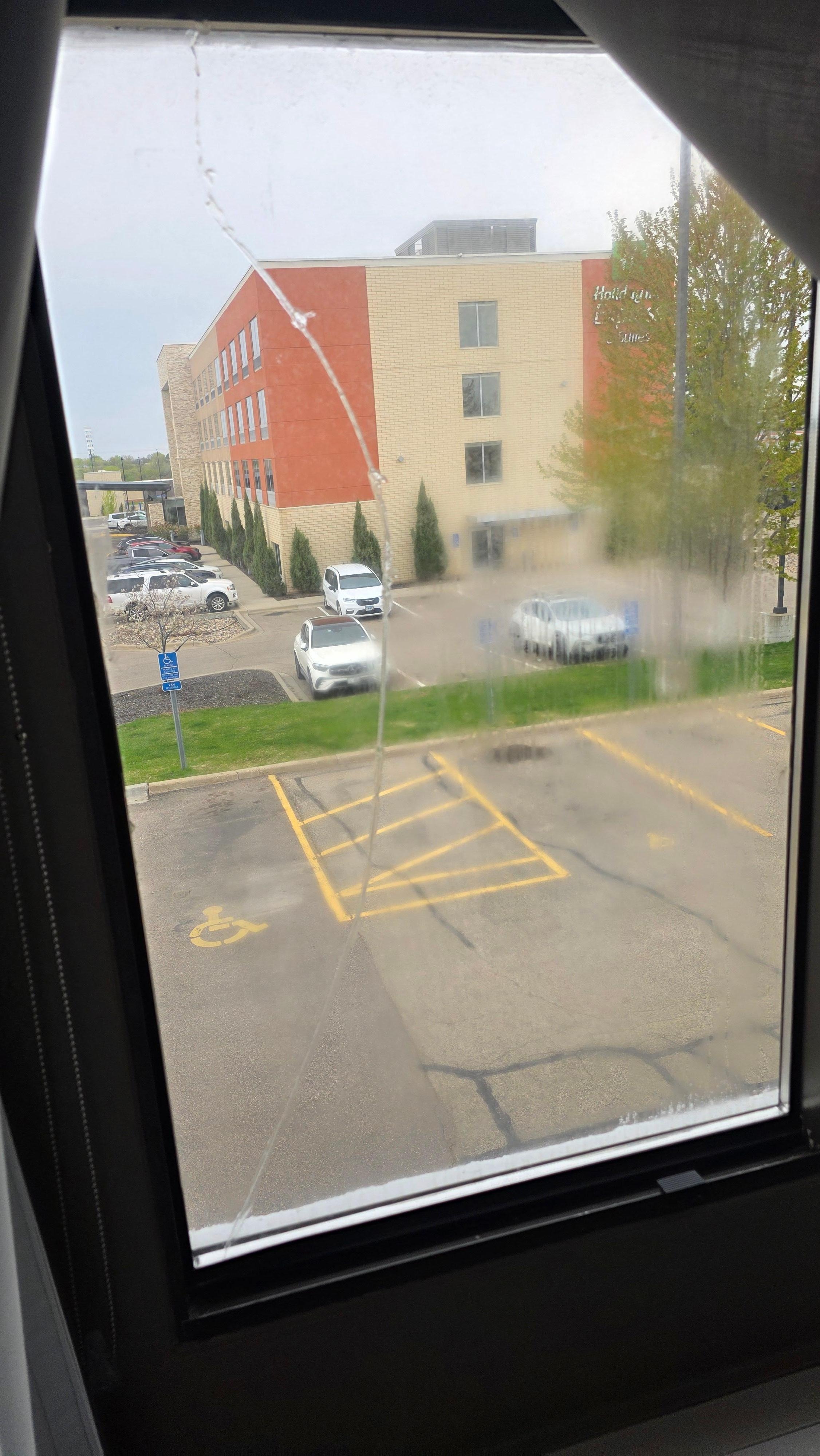 Large crack in room window 