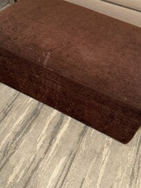 Stains on ottoman in 2nd room change
