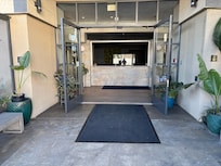 Front entry way with gates open. In the evening the gates are shut, but your room key will open them.