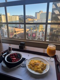 Breakfast in room with view of Hollywood sign