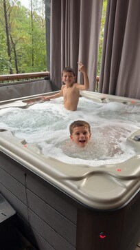 Both boys loved the hot tub. They said they were taking their “outside baths”