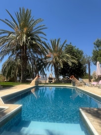 Pool area in peak afternoon