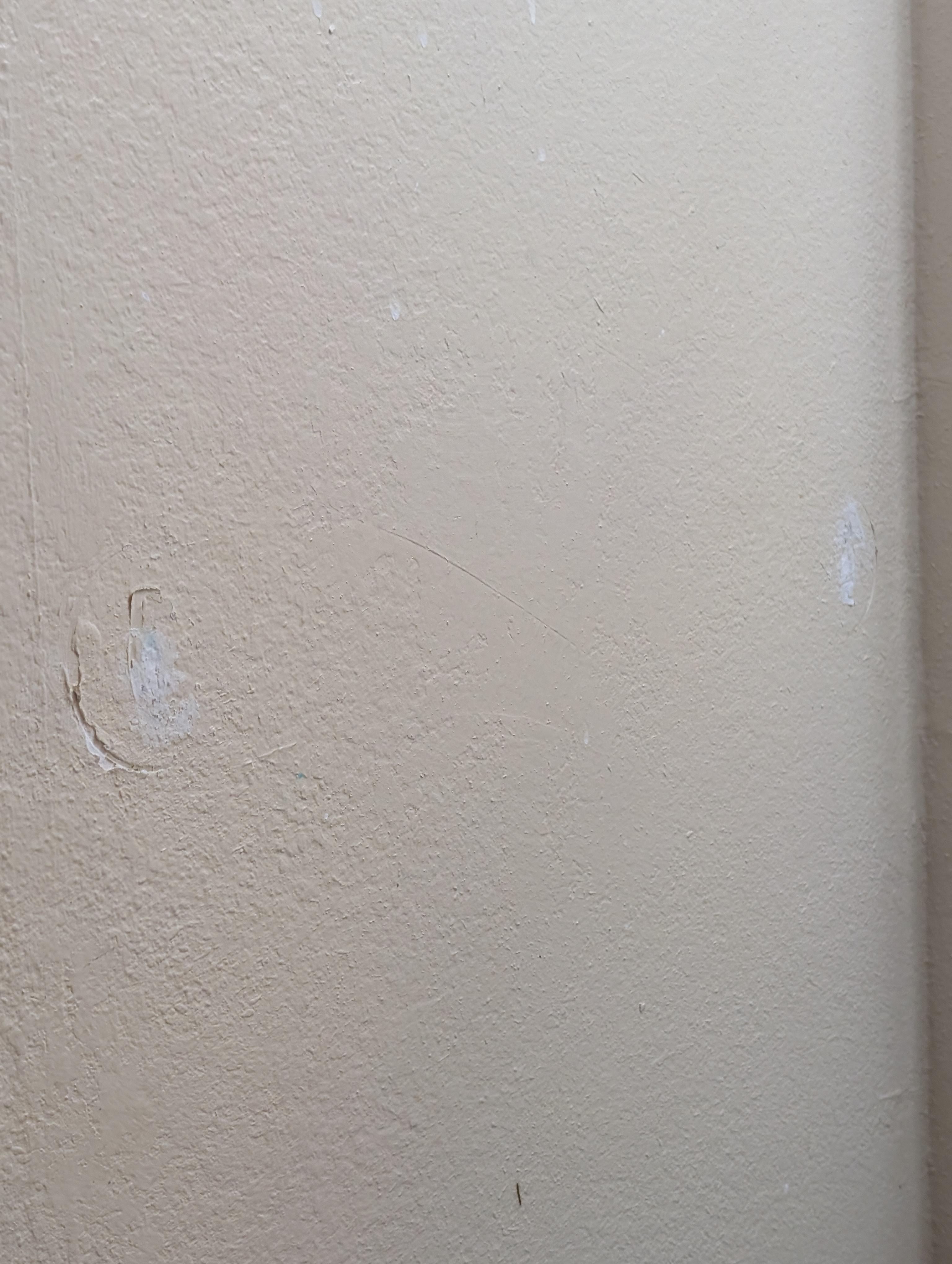 Cracks and dings in all the walls.