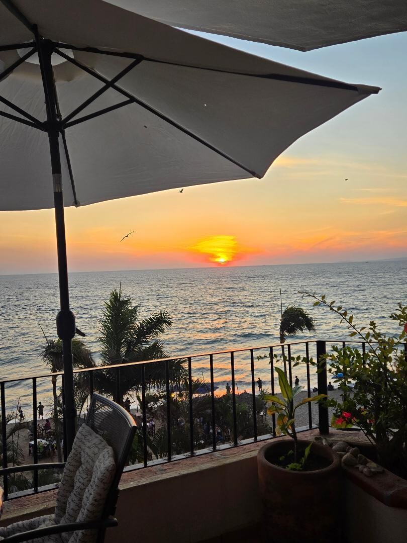 The view of the sunset from the balcony