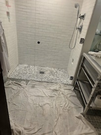 This is the 2nd bathroom, these towels are drenched in water from the shower.
