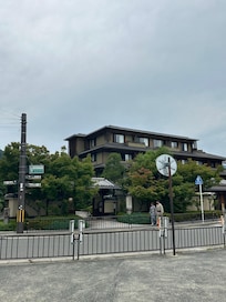 The outside of kadensho hotel from train station across the street
