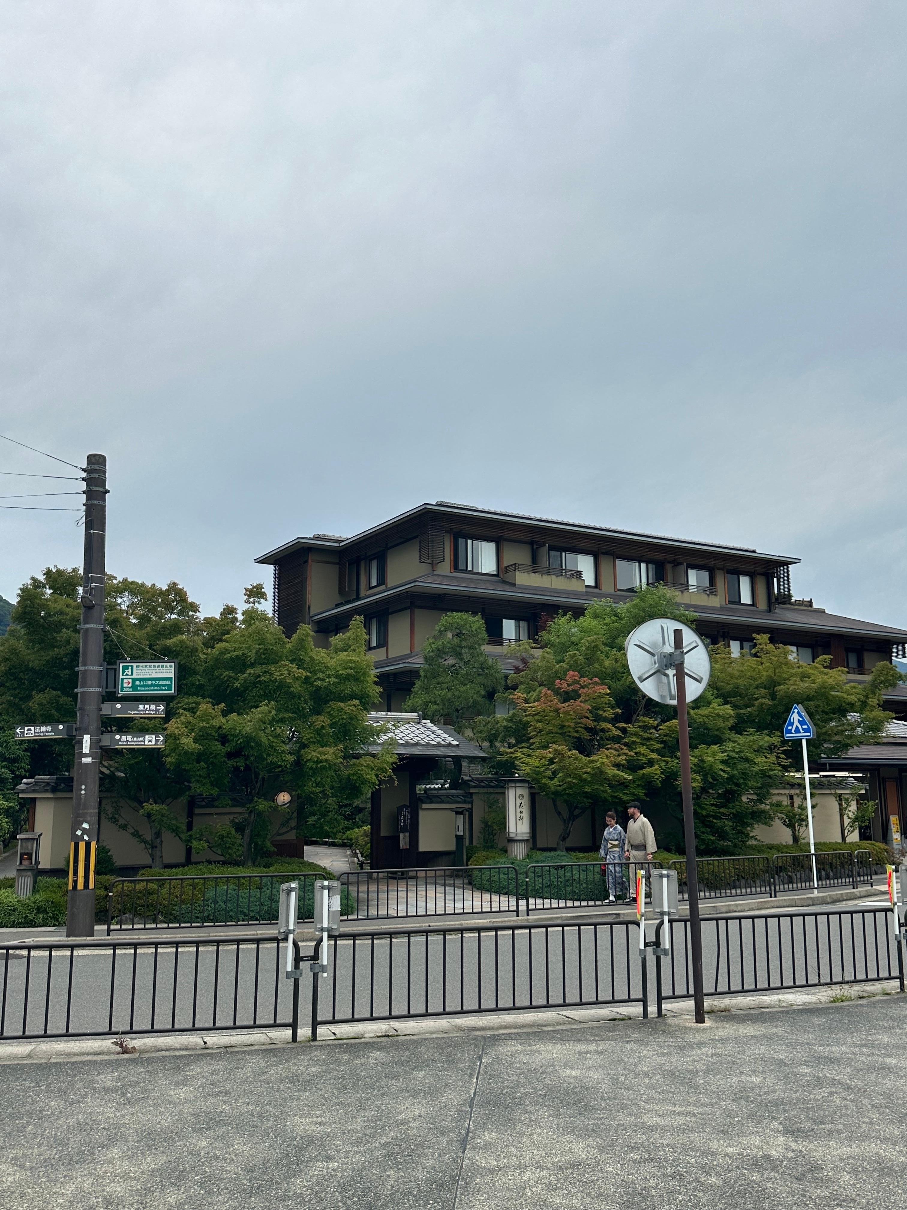 The outside of kadensho hotel from train station across the street