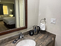 Granite top counters make for a luxury feel and look.