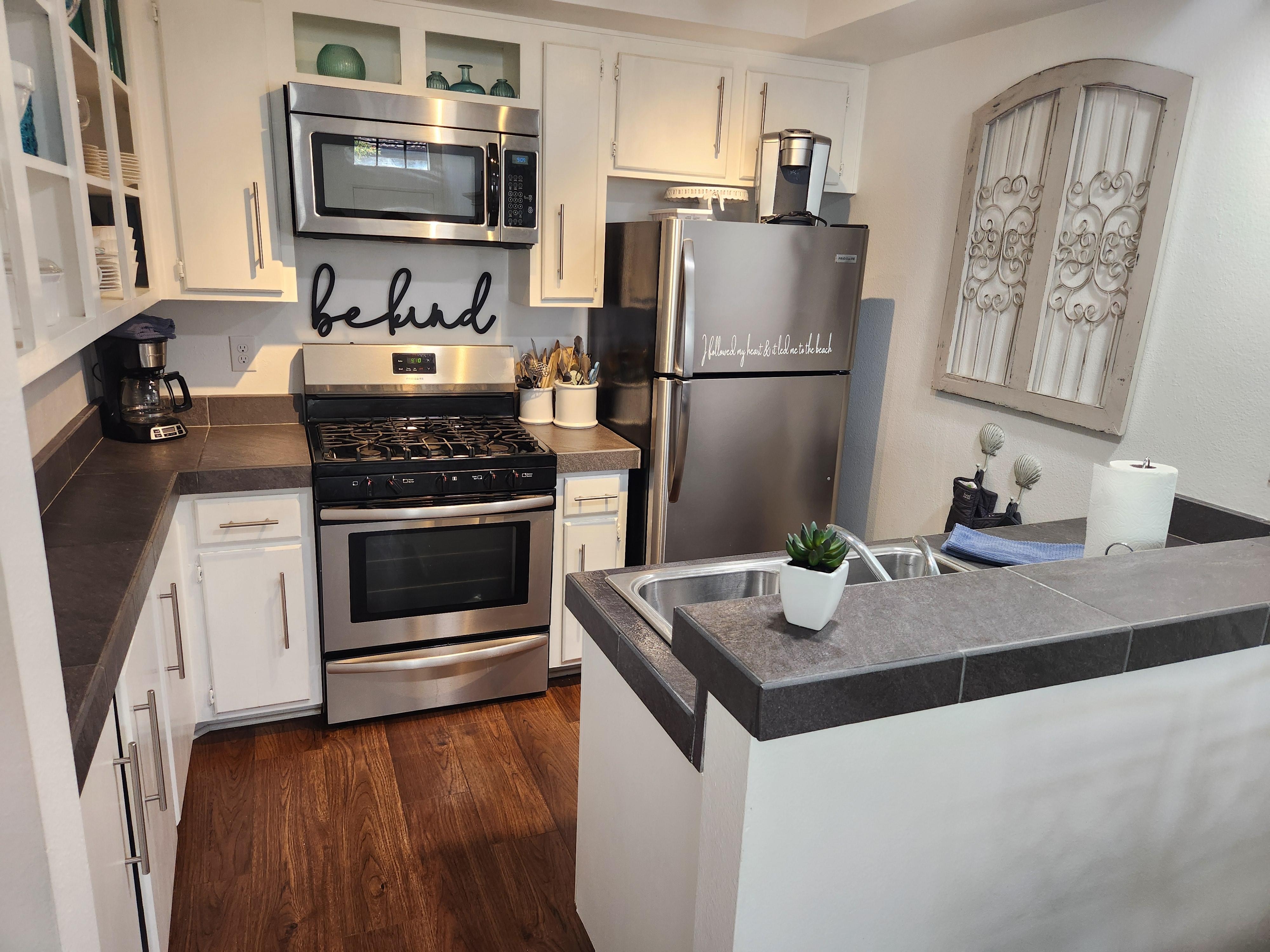 Amazing well stocked with essentials kitchen!