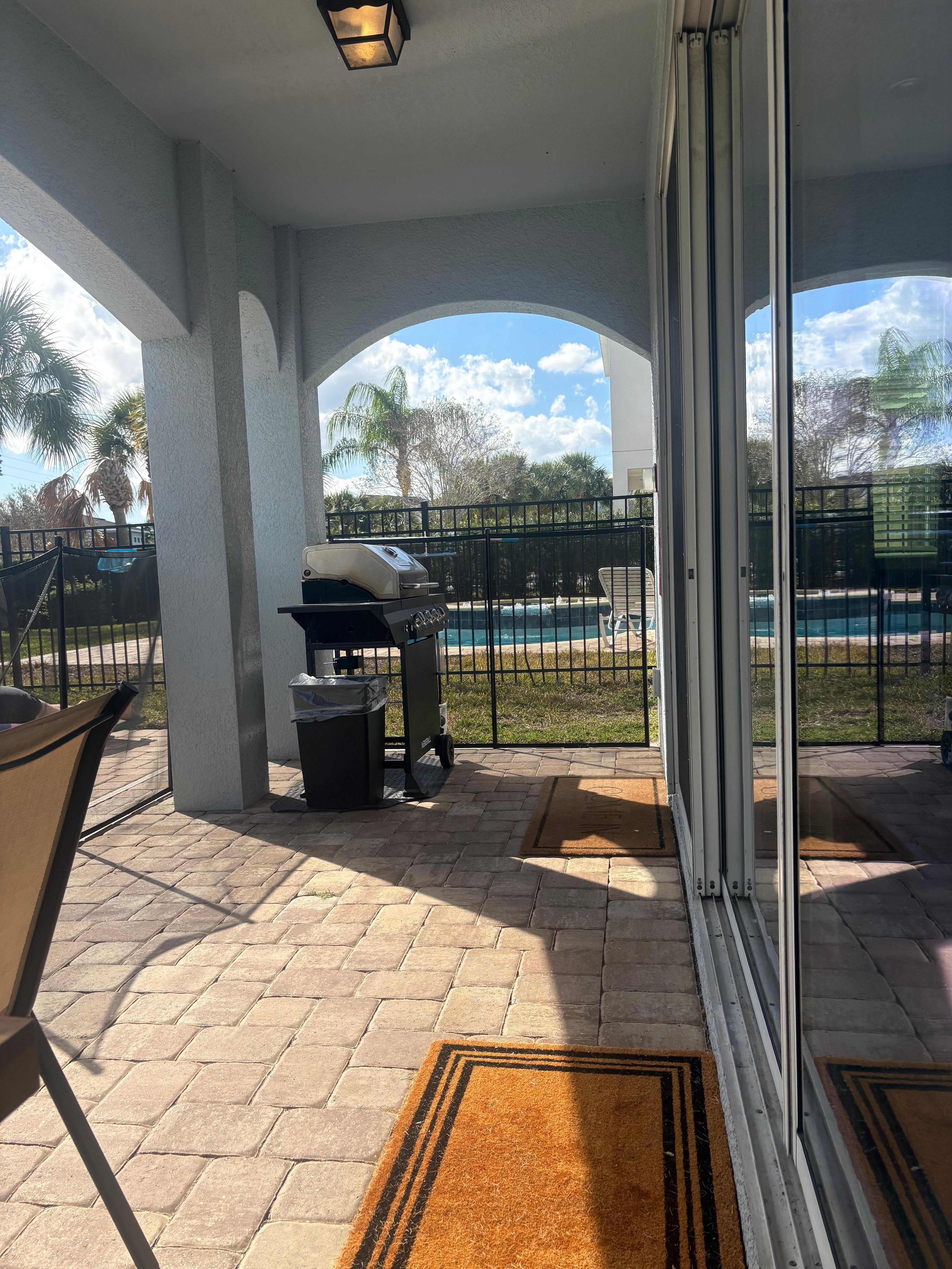 Sitting at the table outside. 