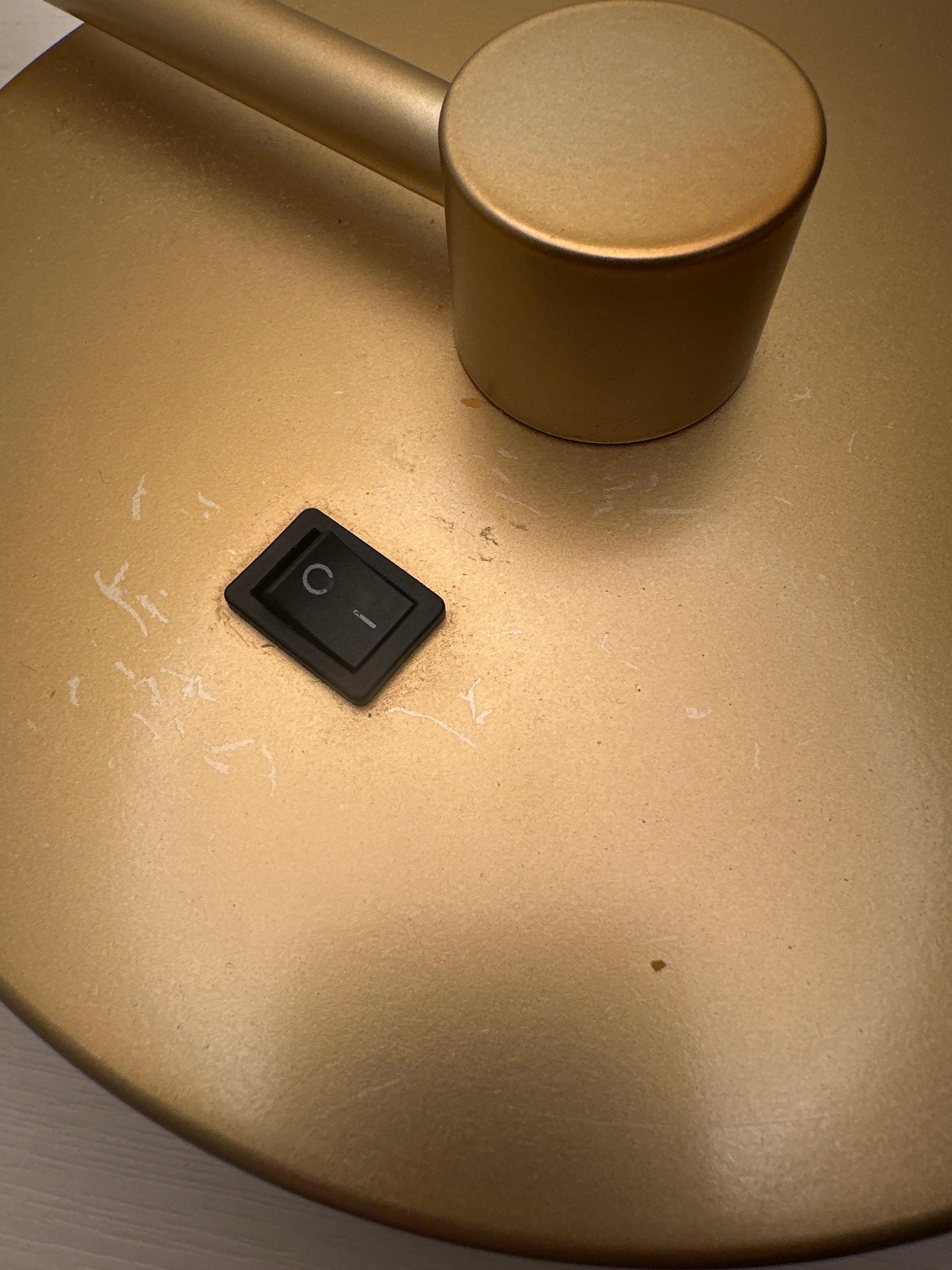 Dirt and dust in one of the bedside lamps.