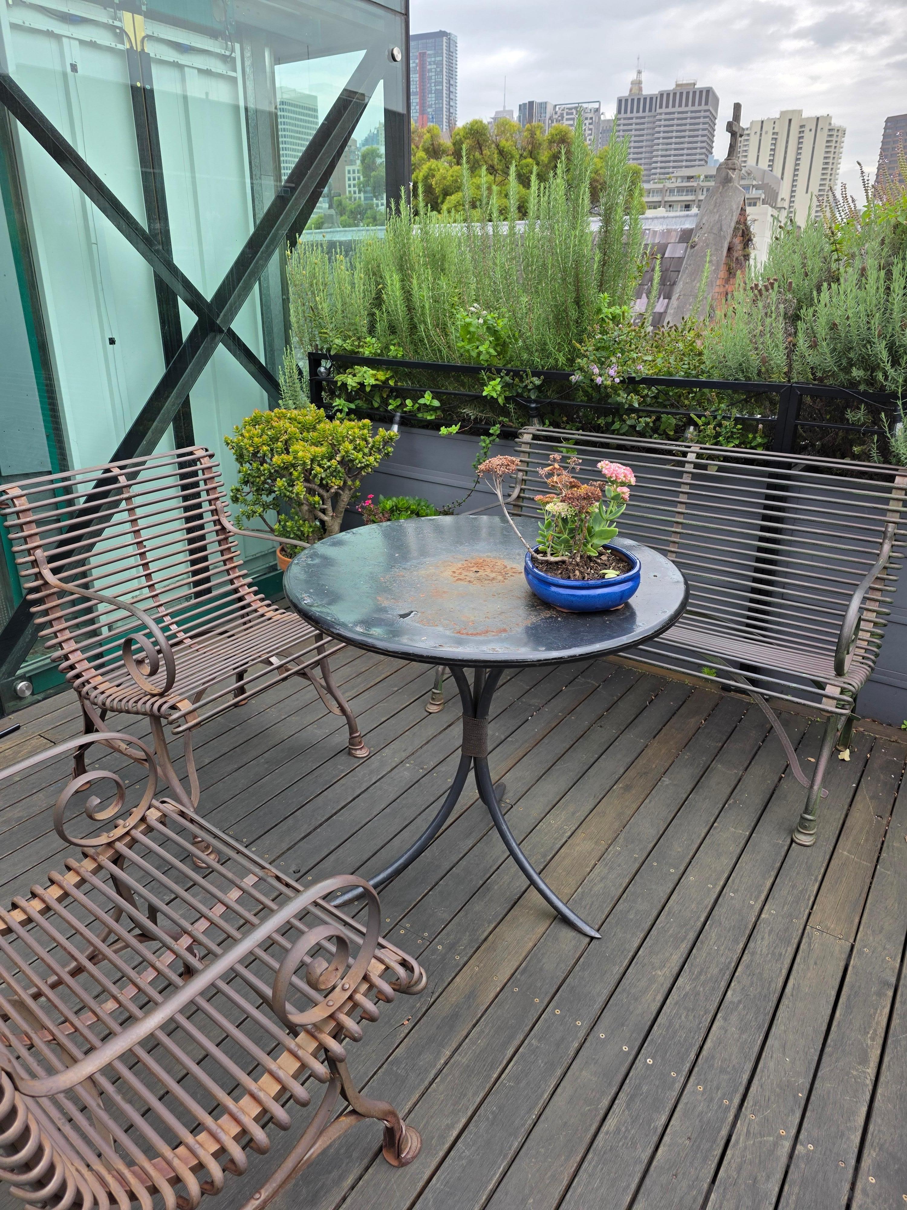 Deck could be nice with softer furniture and if rust was removed. No view but nice space if fixed up a but.