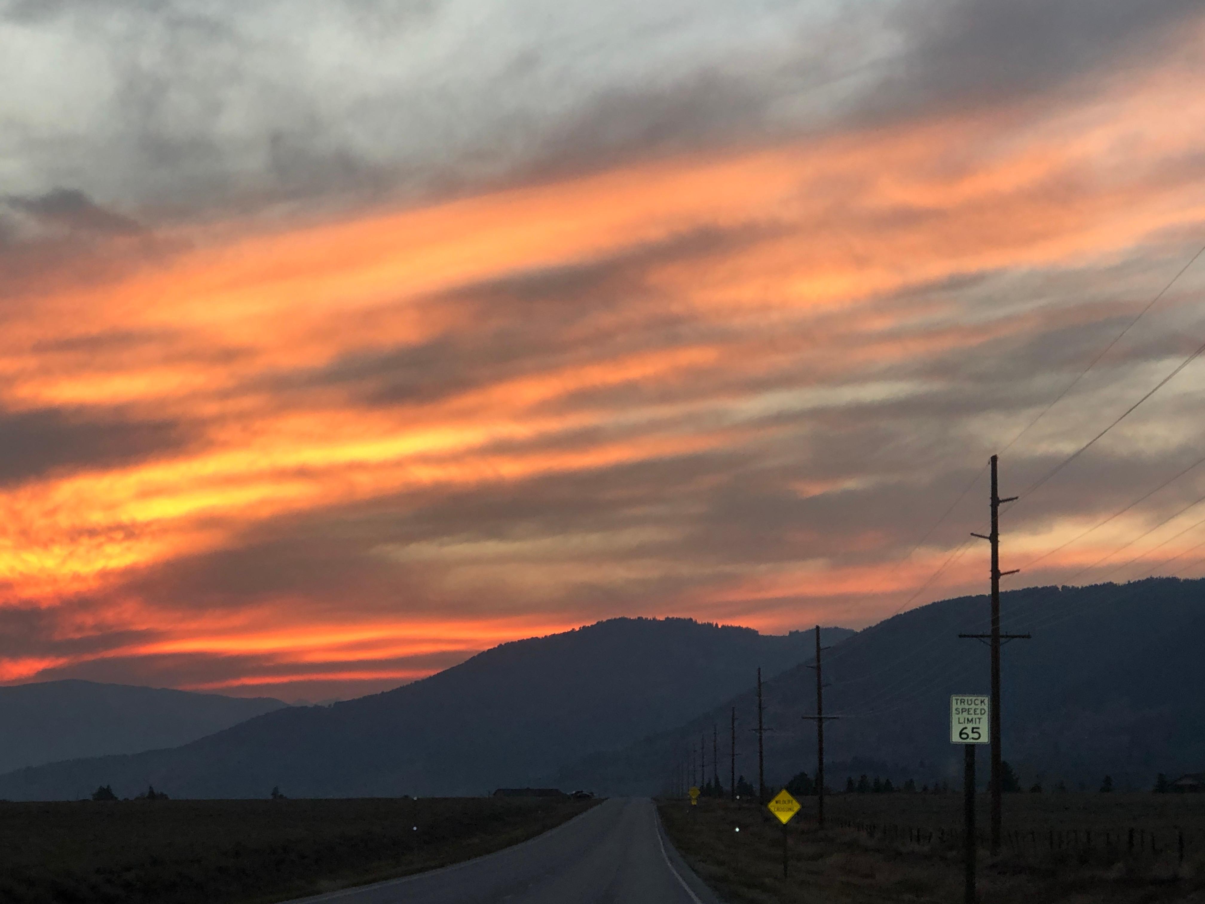 This was the sunset on our way back to the cabin on the road in front of the lake