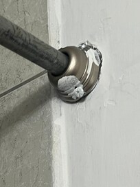 Very old and rusty shower curtain holder