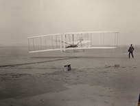 Photo of first ever flight by powered airplane