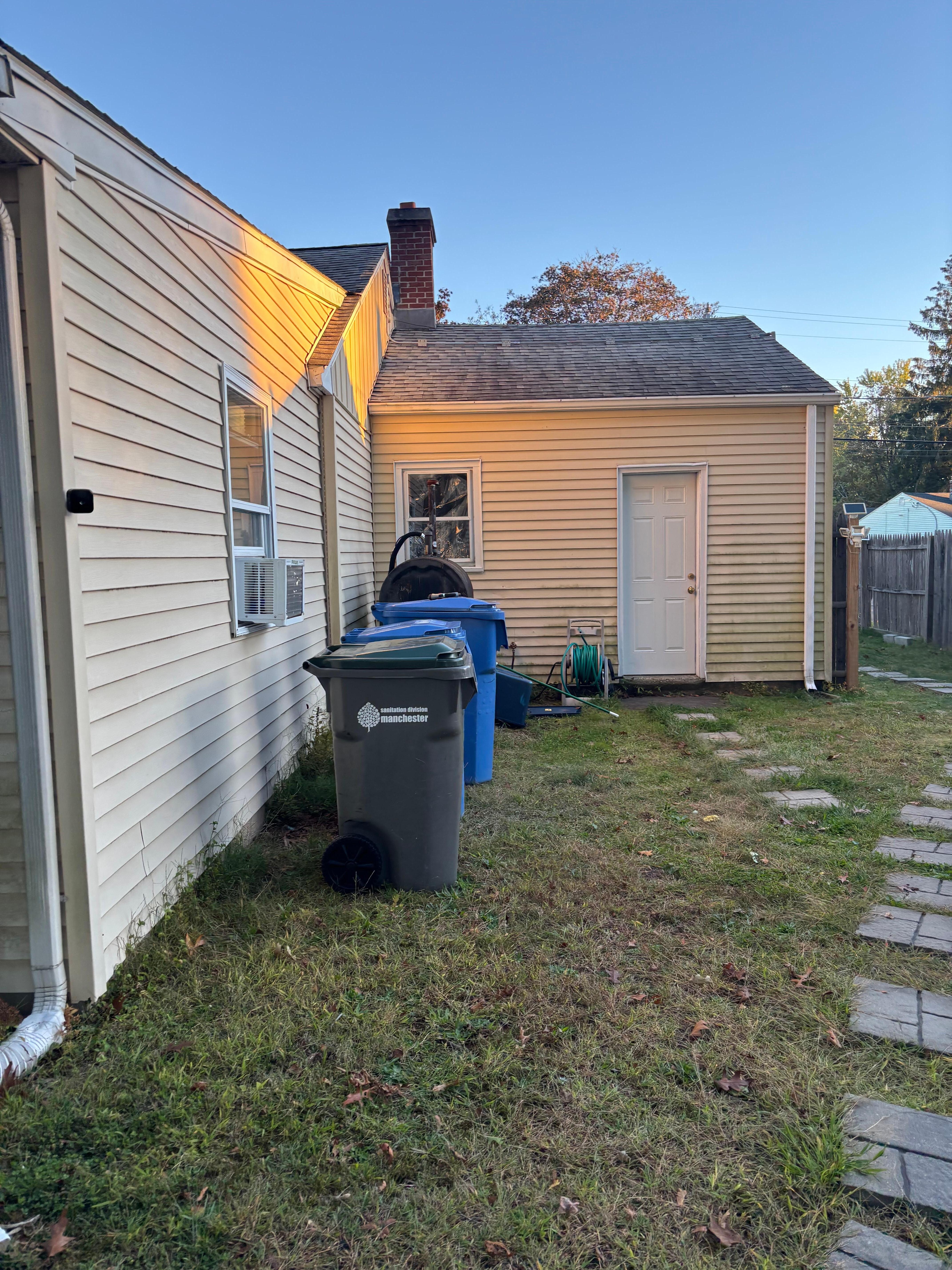 Garage rental entrance in back of house