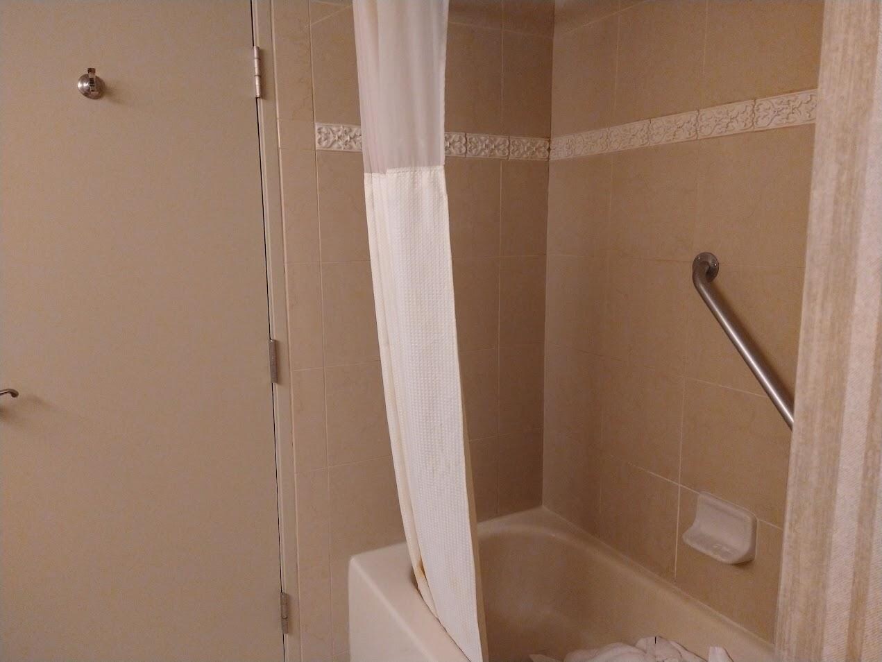 no rack to hold towel hook on door would hold the loop on robe but not a towel
