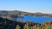 The view is spectacular and you can see the lake from most of the rooms! Arrowhead Village is visible from the dining room, living room and deck.