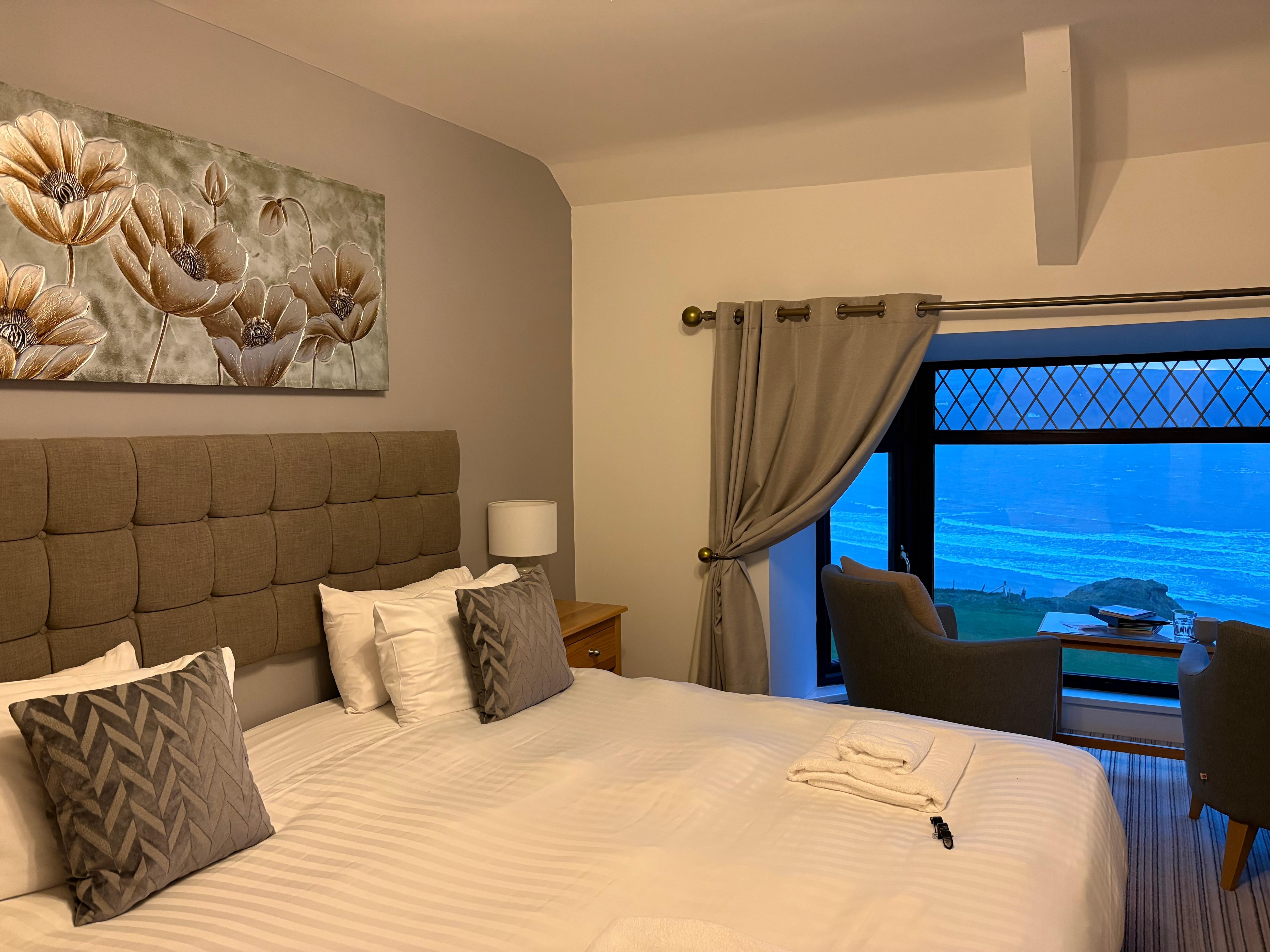 Comfortable room looking out to sea. 