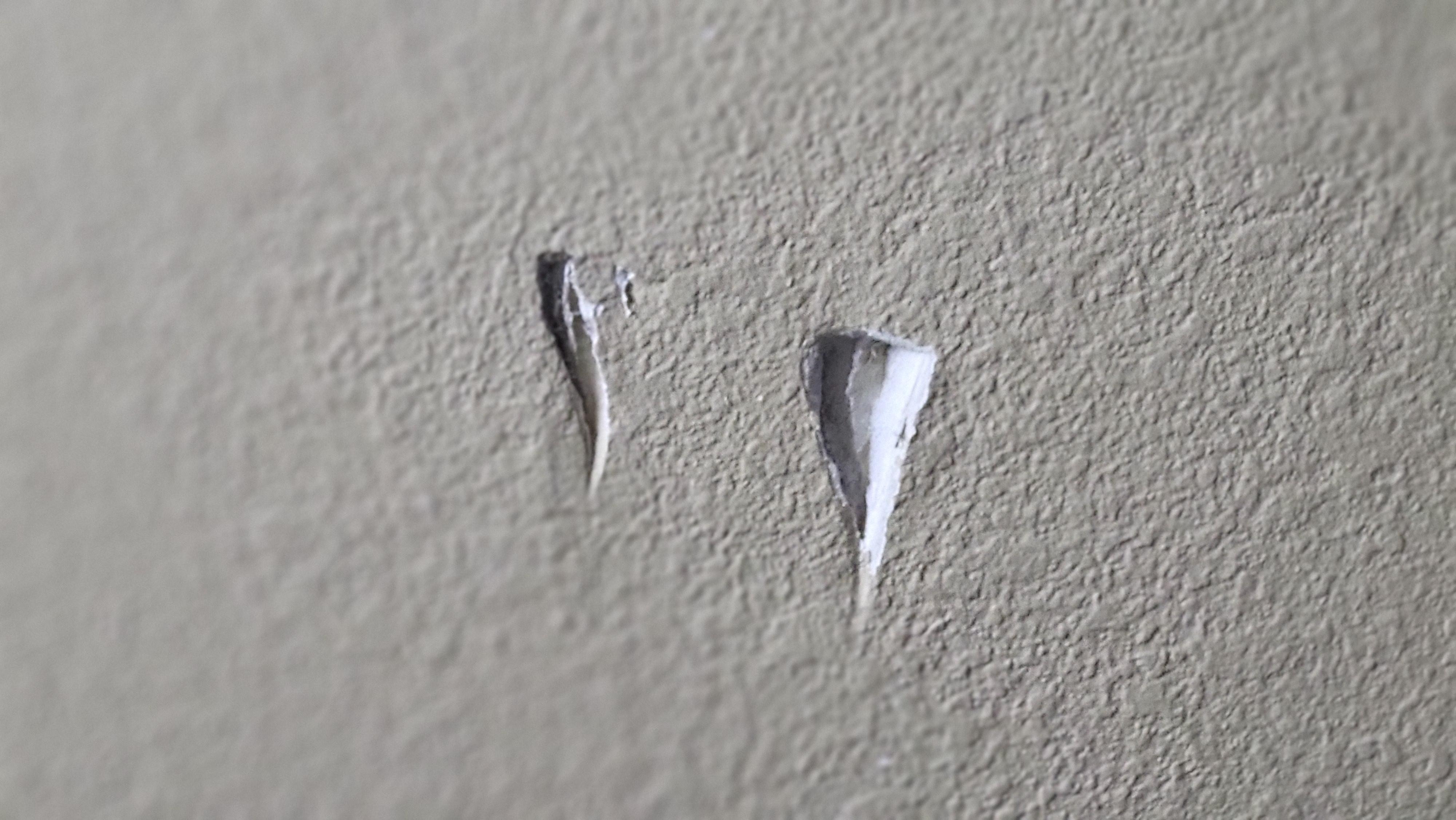 Hole in wall in room