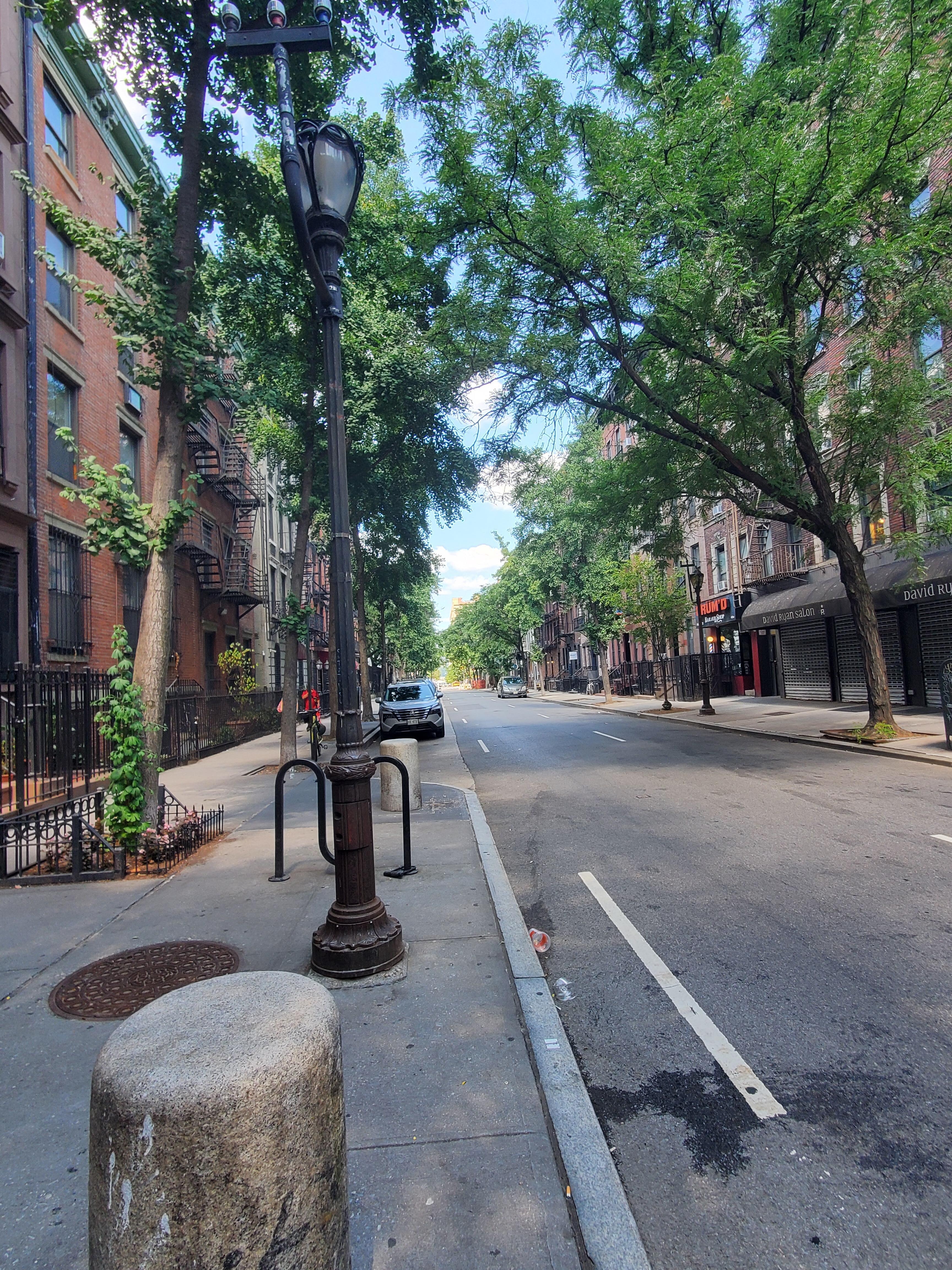 To the left --coming out of the apartment