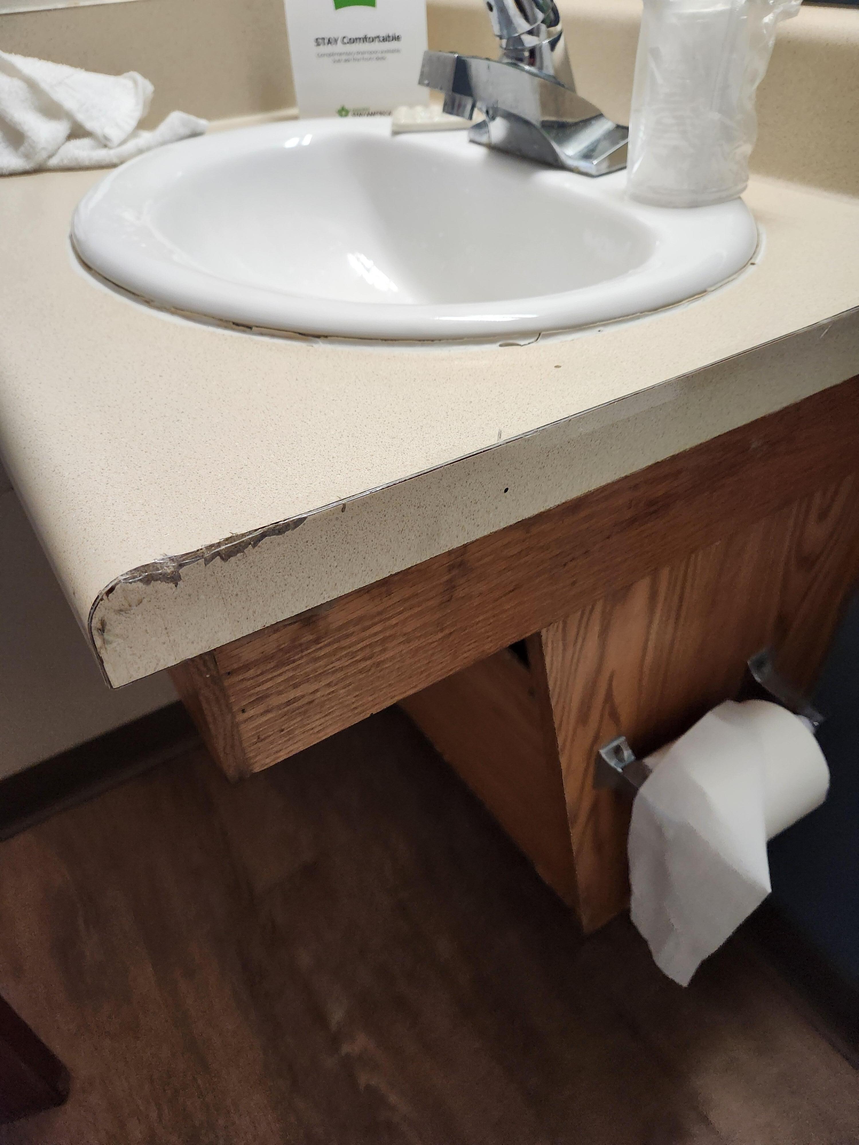 messy job of repair on sink very old ,floor very dirty ,stains were around toilet area of floor