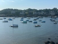 Rockport Harbor with a fleet of Rhodes 19 sailboats
