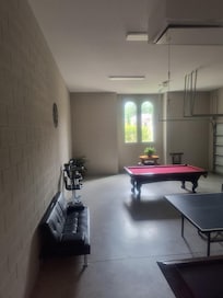 The game room/garage was actually a great addition. Unfortunately, there is only 1 pool cue available, and the tip had been broken off and had to be taped back on.