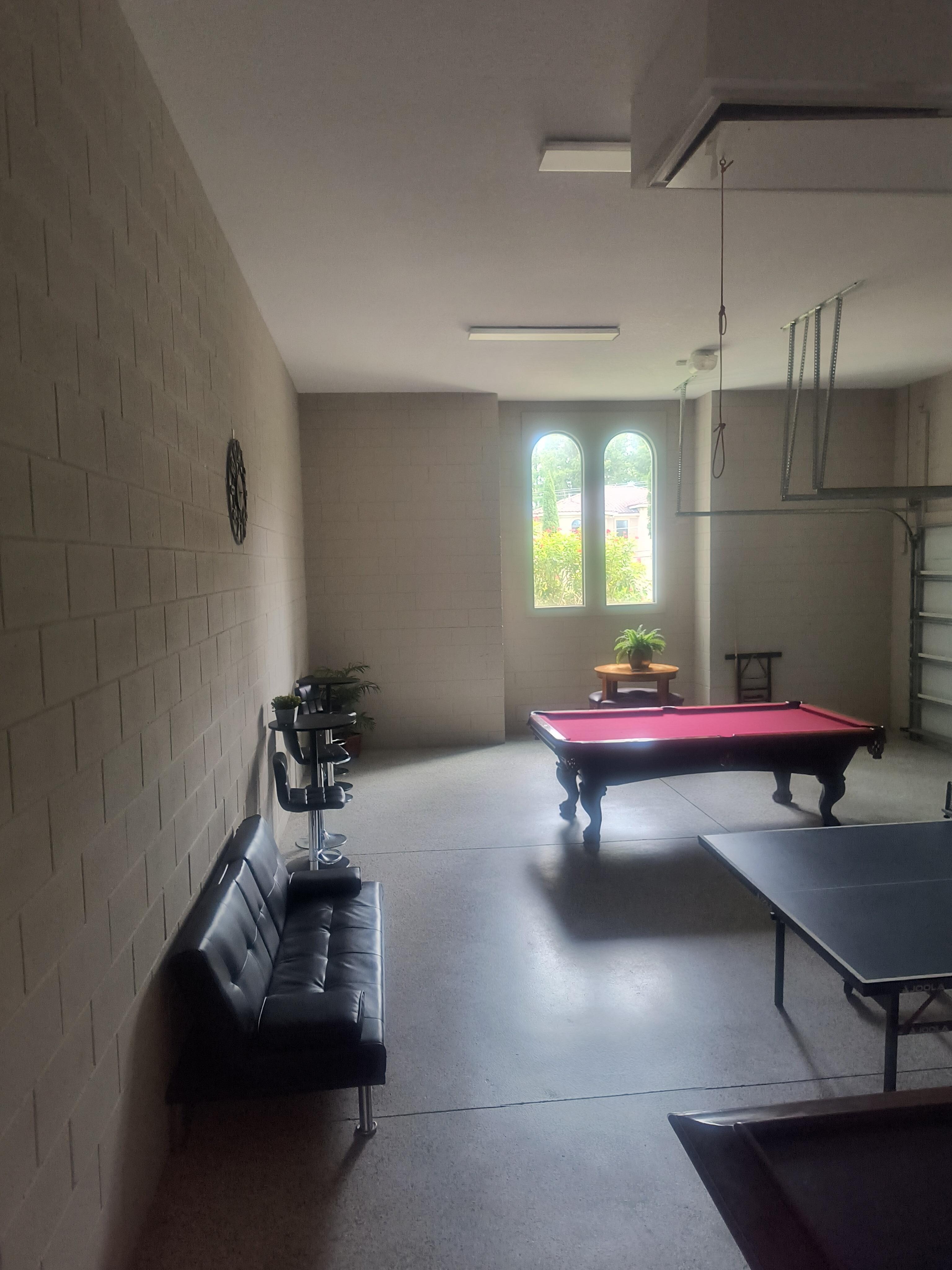 The game room/garage was actually a great addition. Unfortunately, there is only 1 pool cue available, and the tip had been broken off and had to be taped back on.