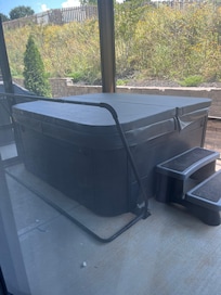 Screened in patio /hot tub