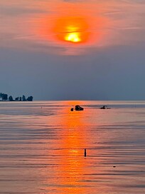 Sunset across the street from our room. Oneida Lake sunset.