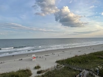 View of beach from balcony.
