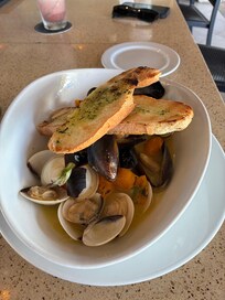 Absolutely delicious blend of muscles and clams at the tiki bar