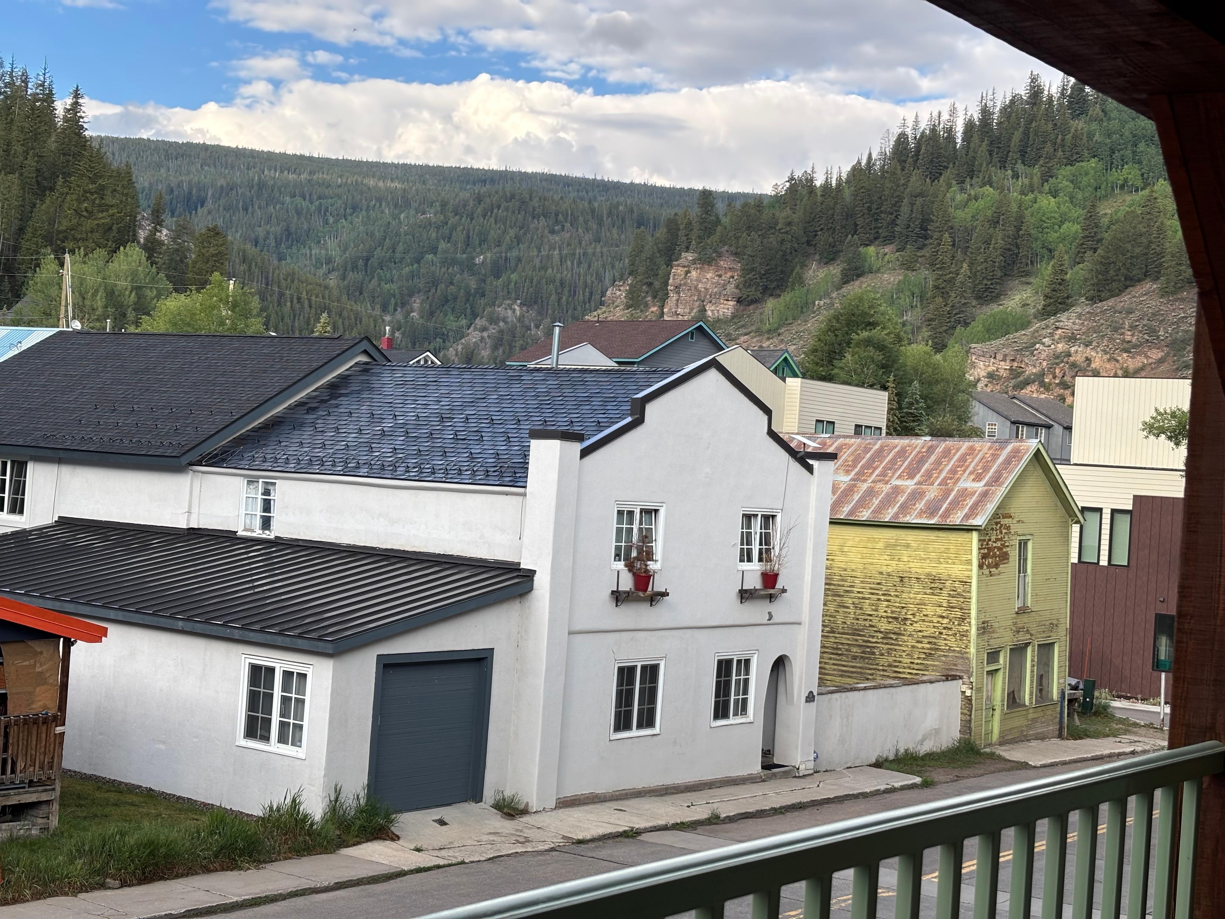 Off balcony, across the street. Brothol from the 1800s and old Post office