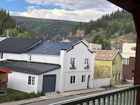 Off balcony, across the street. Brothol from the 1800s and old Post office