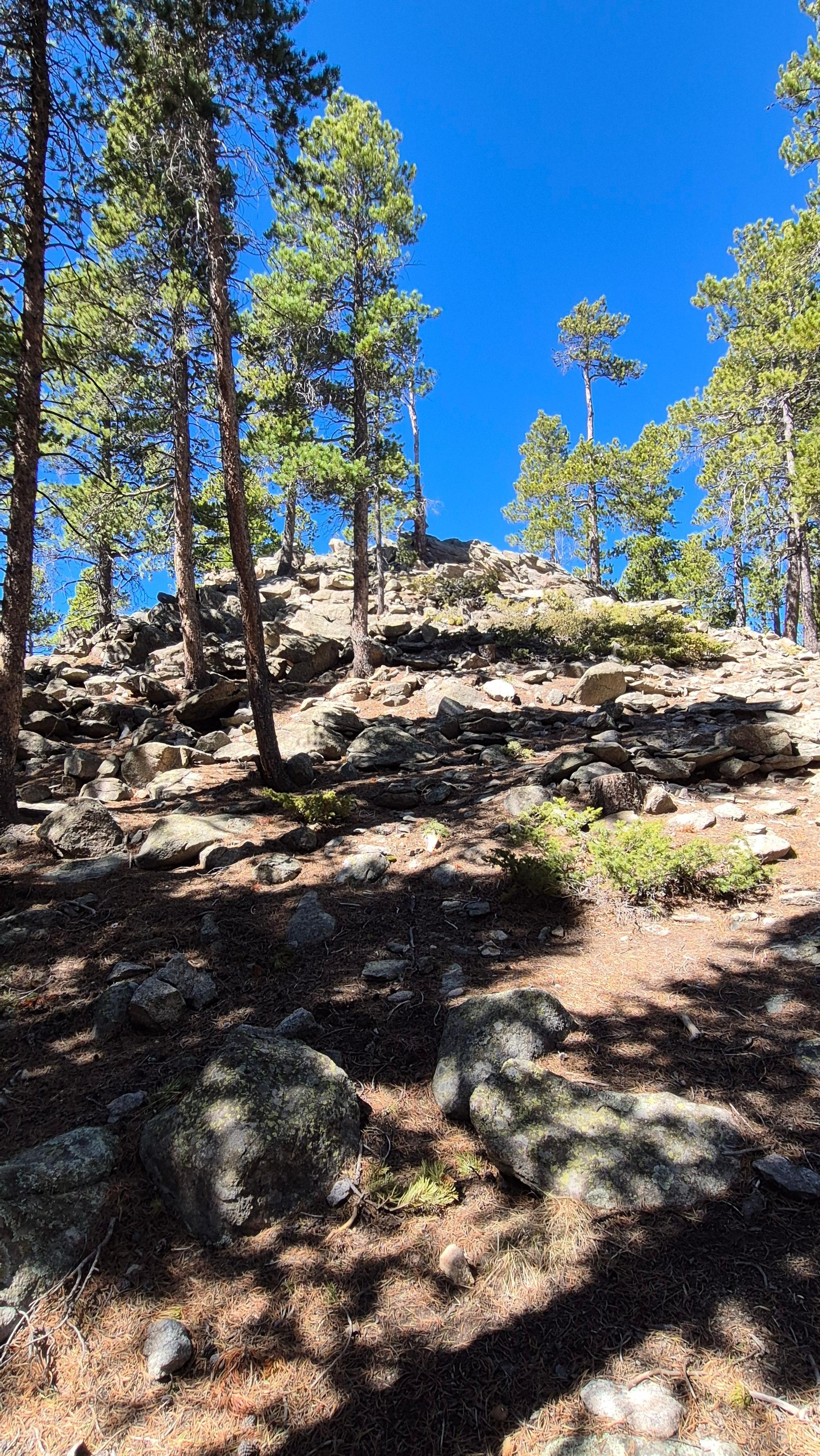 You have to climb the rocks on the back of the property.   Beautiful view and easy climb.  Took about a minute to get up top.  
