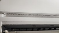 Dust filled AC unit.
