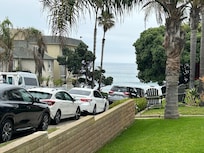 I drink my coffee sitting on the wall. This is the front yard looking down towards the ocean.